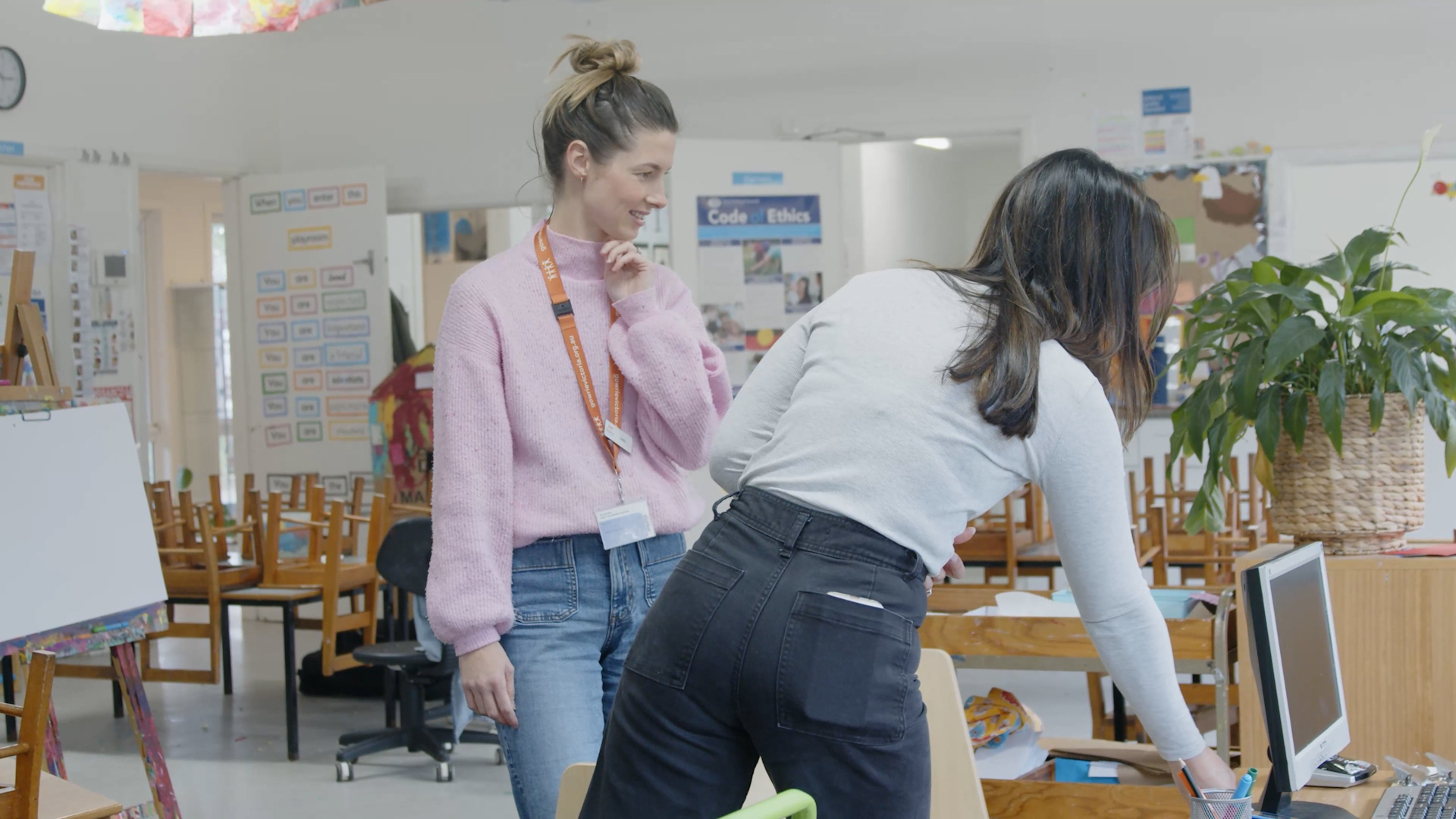 Teacher pointing at something